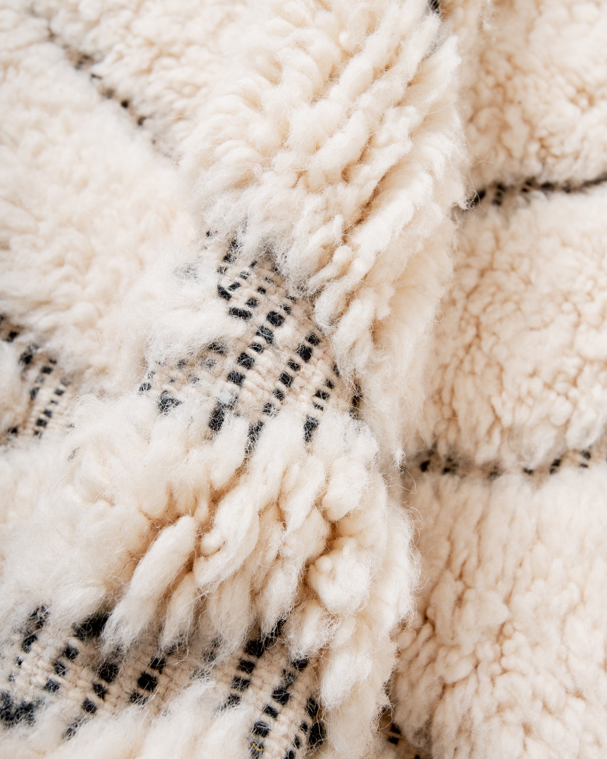 Modern, designer, handcrafted Berber rug from Morocco. Beniourain carpet with beautiful colours and patterns and fluffy wool texture.